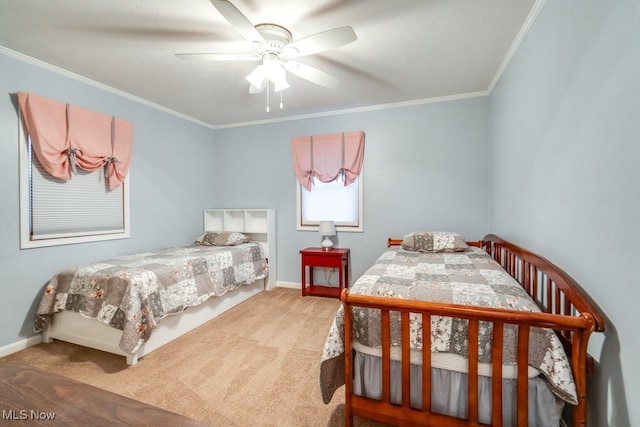 bedroom with ornamental molding, light carpet, and ceiling fan