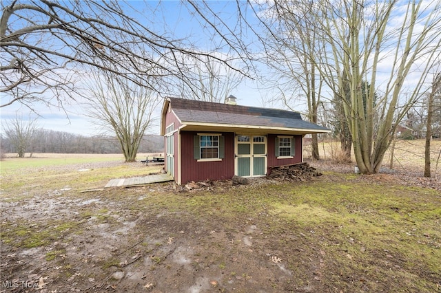 view of outbuilding featuring an outdoor structure