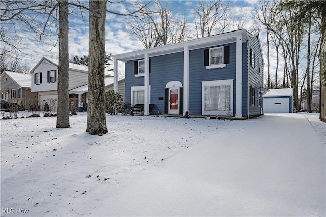 view of front of house featuring an outbuilding and a garage