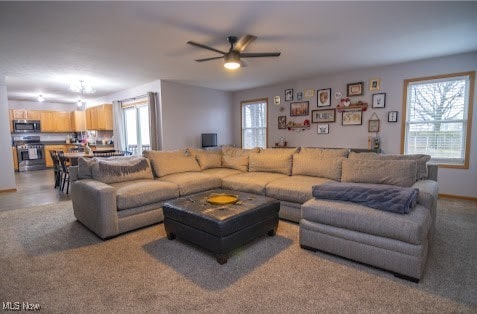 living room featuring ceiling fan