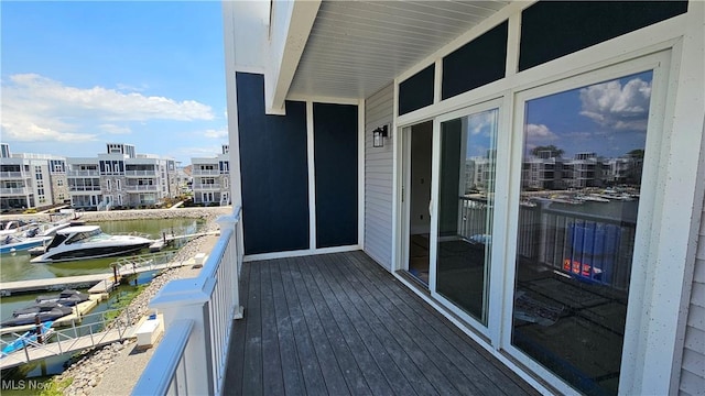 balcony featuring a water view