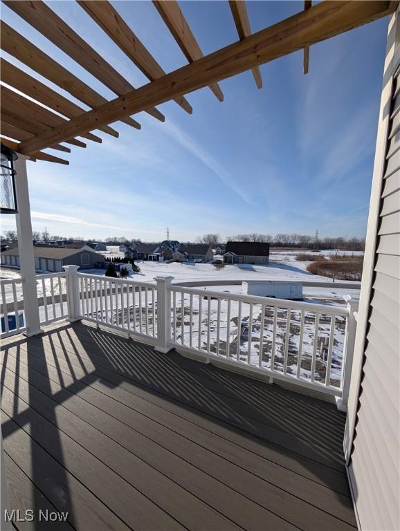 view of snow covered deck