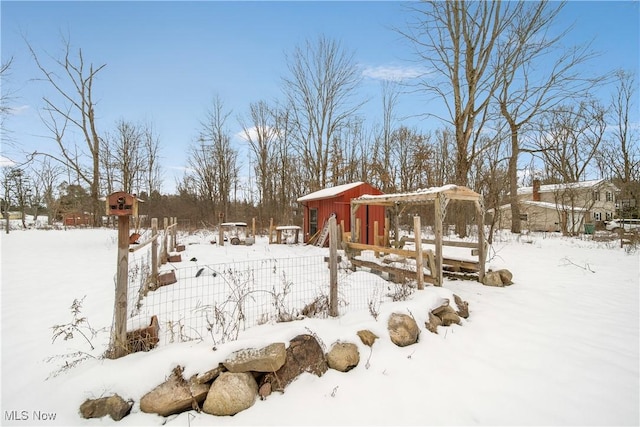 view of yard layered in snow