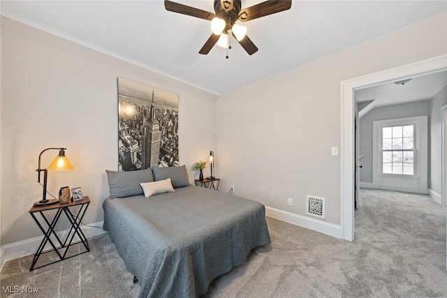 bedroom featuring ceiling fan and carpet flooring