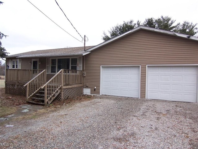 ranch-style house featuring a garage