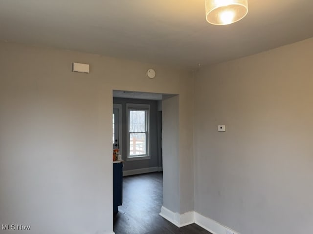 interior space with dark hardwood / wood-style flooring