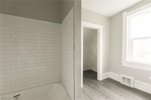 bathroom with wood-type flooring