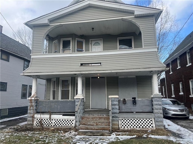 view of front of property featuring covered porch