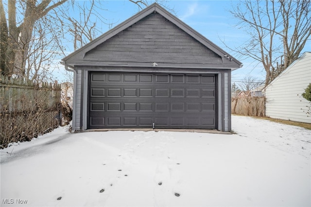 view of snow covered garage