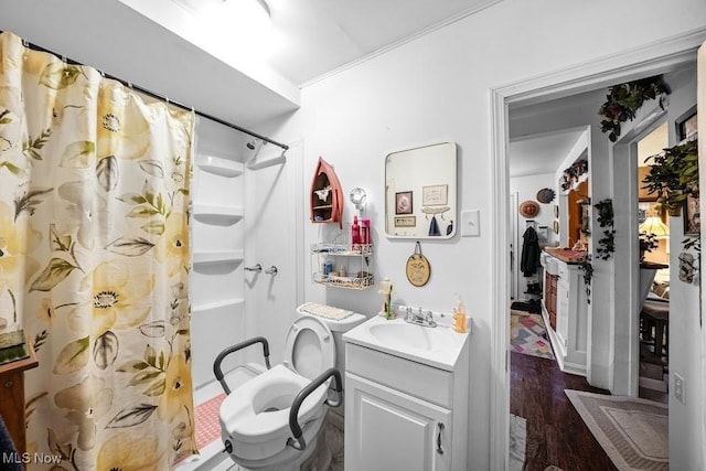 bathroom featuring vanity, a shower with curtain, wood-type flooring, and toilet