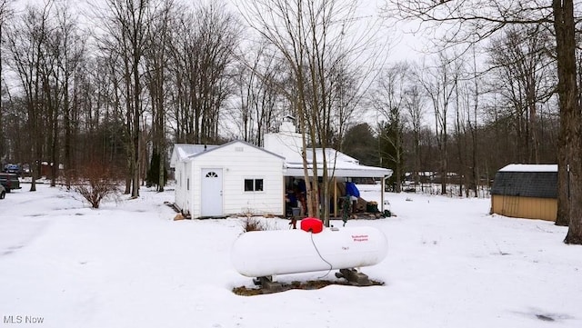 exterior space with a storage shed