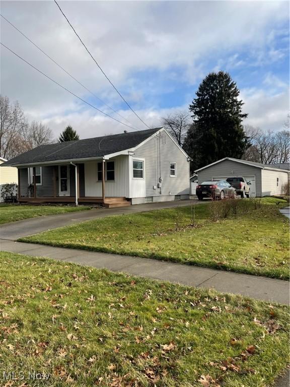 view of front of home with a porch and a front lawn