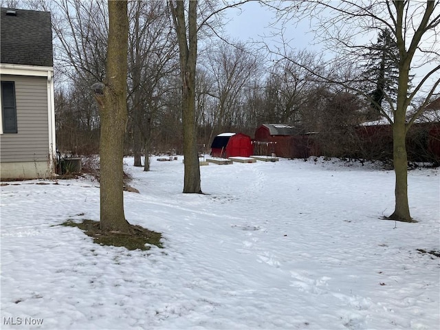 view of yard covered in snow