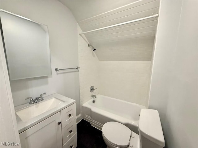 full bathroom featuring vanity, toilet, and tiled shower / bath