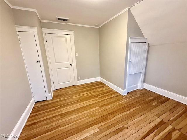 bonus room with light hardwood / wood-style floors