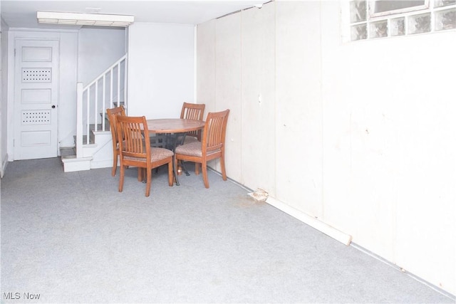 dining space with carpet floors