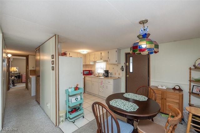 dining space with sink