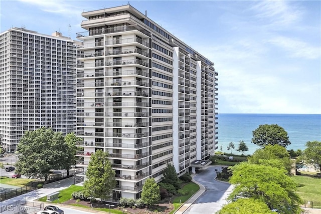 view of building exterior featuring a water view