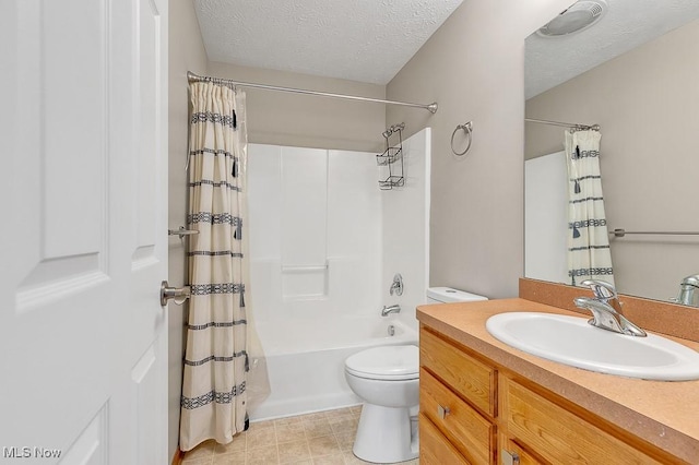 bathroom featuring toilet, shower / tub combo with curtain, a textured ceiling, and vanity