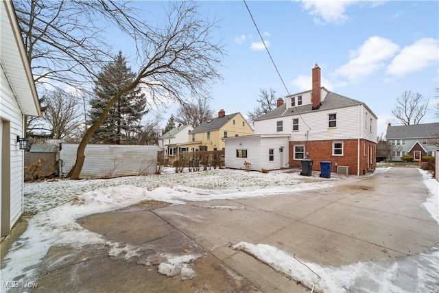 view of snow covered property