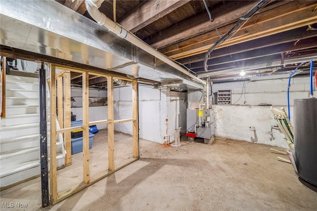 basement with heating unit and gas water heater