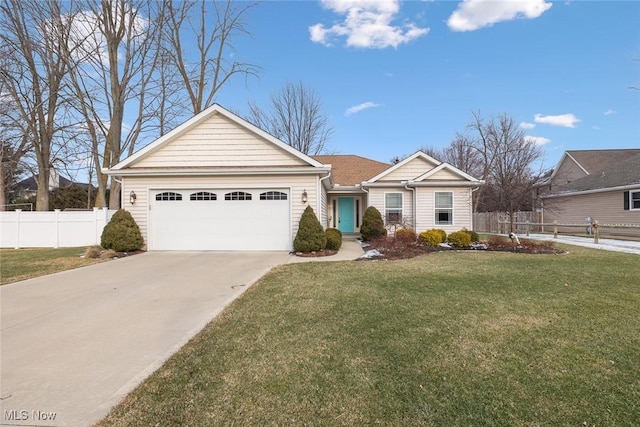 ranch-style house featuring a garage and a front lawn