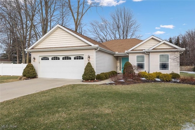 ranch-style home featuring a garage and a front yard