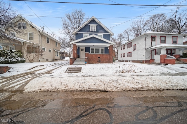 view of front of home featuring brick siding