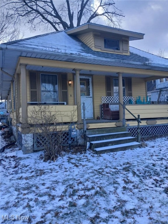 bungalow-style house featuring covered porch