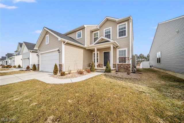 view of front of house featuring a garage, a porch, and a front yard