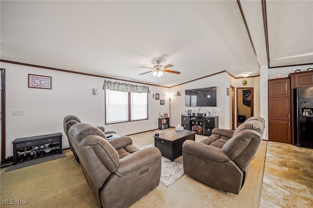 living room featuring ornamental molding and ceiling fan