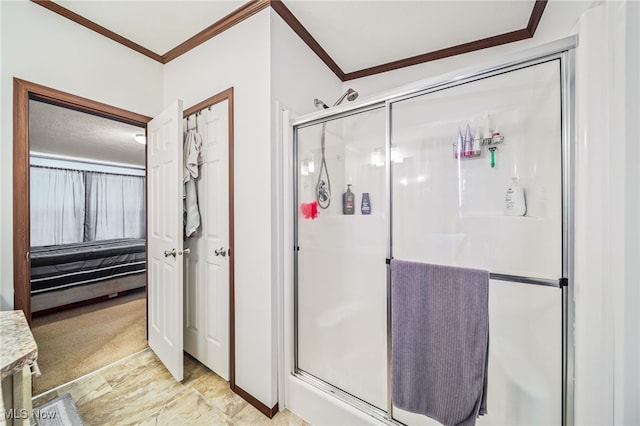 bathroom featuring ornamental molding and walk in shower