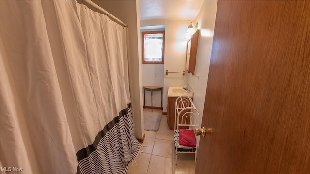 bathroom featuring vanity and tile patterned flooring