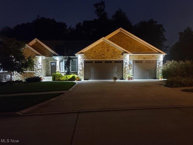 view of front of property featuring a garage