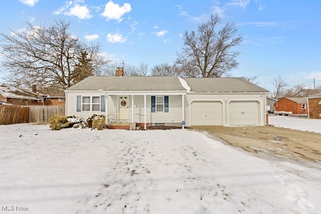 ranch-style house with a chimney, an attached garage, and fence