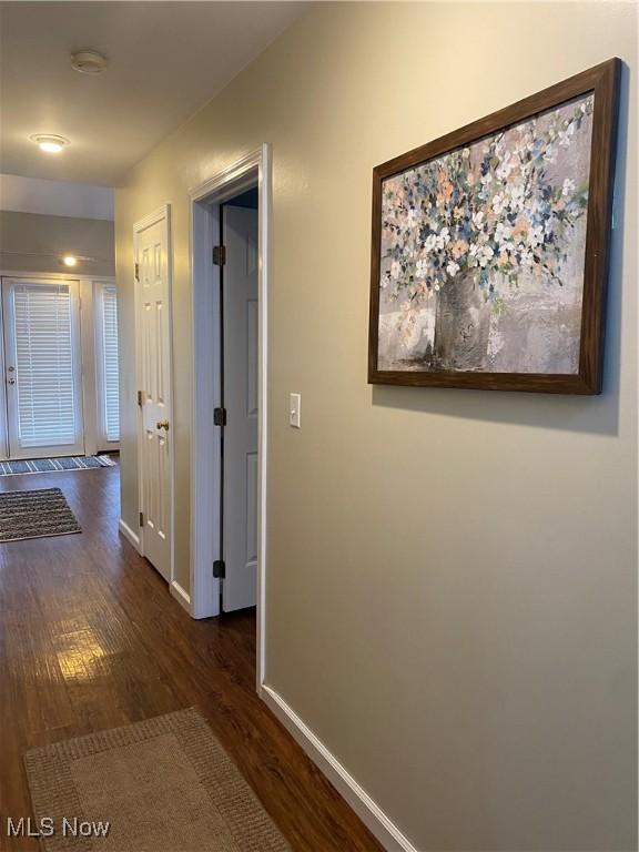 hall featuring dark hardwood / wood-style floors