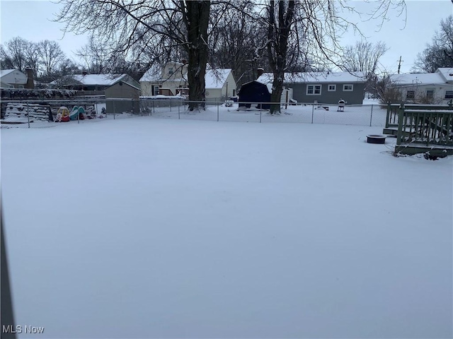 view of yard covered in snow