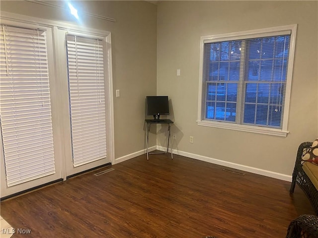 interior space featuring dark hardwood / wood-style flooring