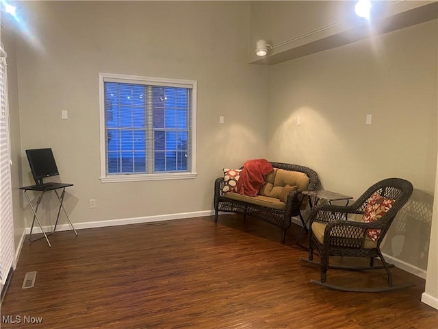 living area featuring dark hardwood / wood-style floors