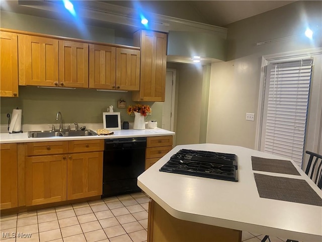 kitchen featuring sink, light tile patterned floors, and black appliances