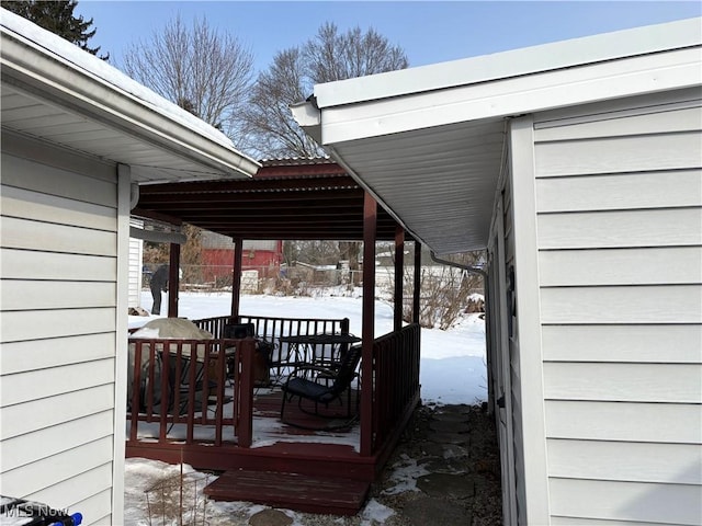 view of snow covered deck