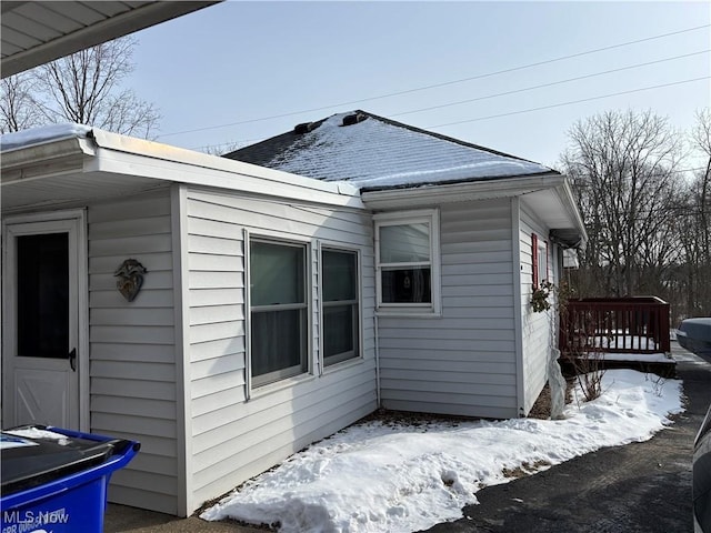 view of snow covered property