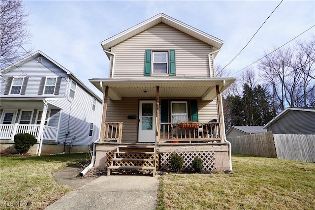 view of front of home featuring a front lawn and a porch