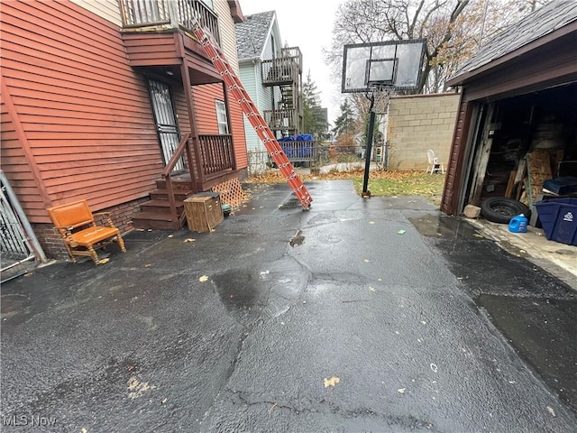 view of patio with a garage