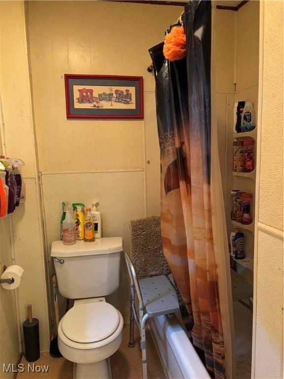 428 Foster Ave, Cambridge, OH 43725 - bathroom with toilet and shower / bath combination with curtain