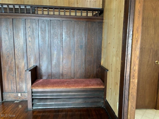 stairway with wood walls