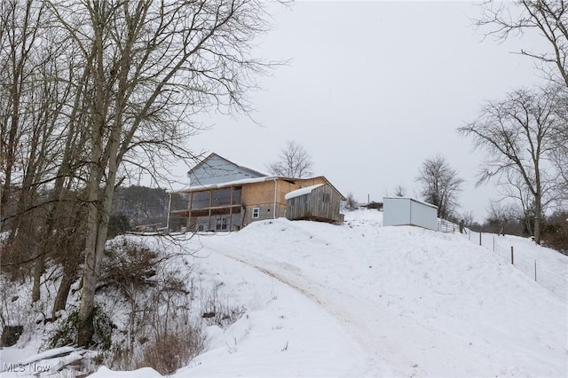 view of yard covered in snow