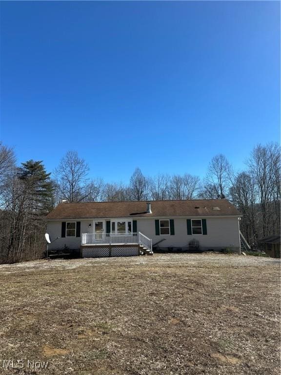 view of front of property featuring a deck