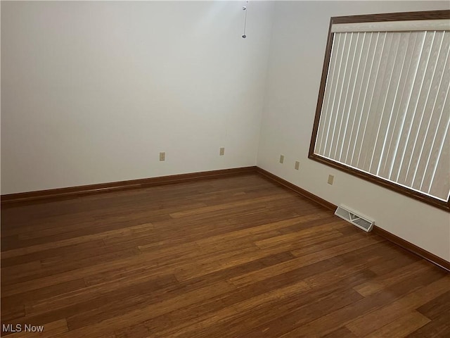 6695 Clingan Rd Unit 26, Poland, OH 44514 - unfurnished room featuring baseboards and wood finished floors