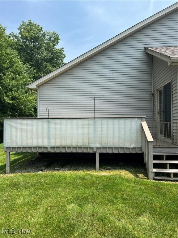 6695 Clingan Rd Unit 26, Poland, OH 44514 - view of home's exterior with a lawn